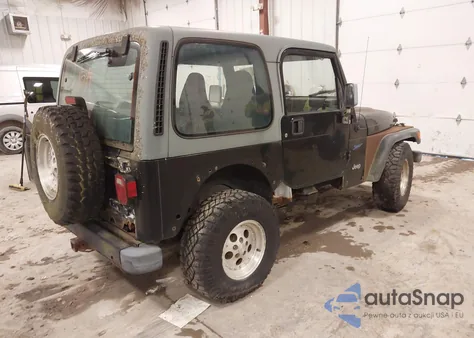 1998 Jeep Wrangler Sport z USA, uszkodzony, nr VIN 1J4FY19S7WP740040